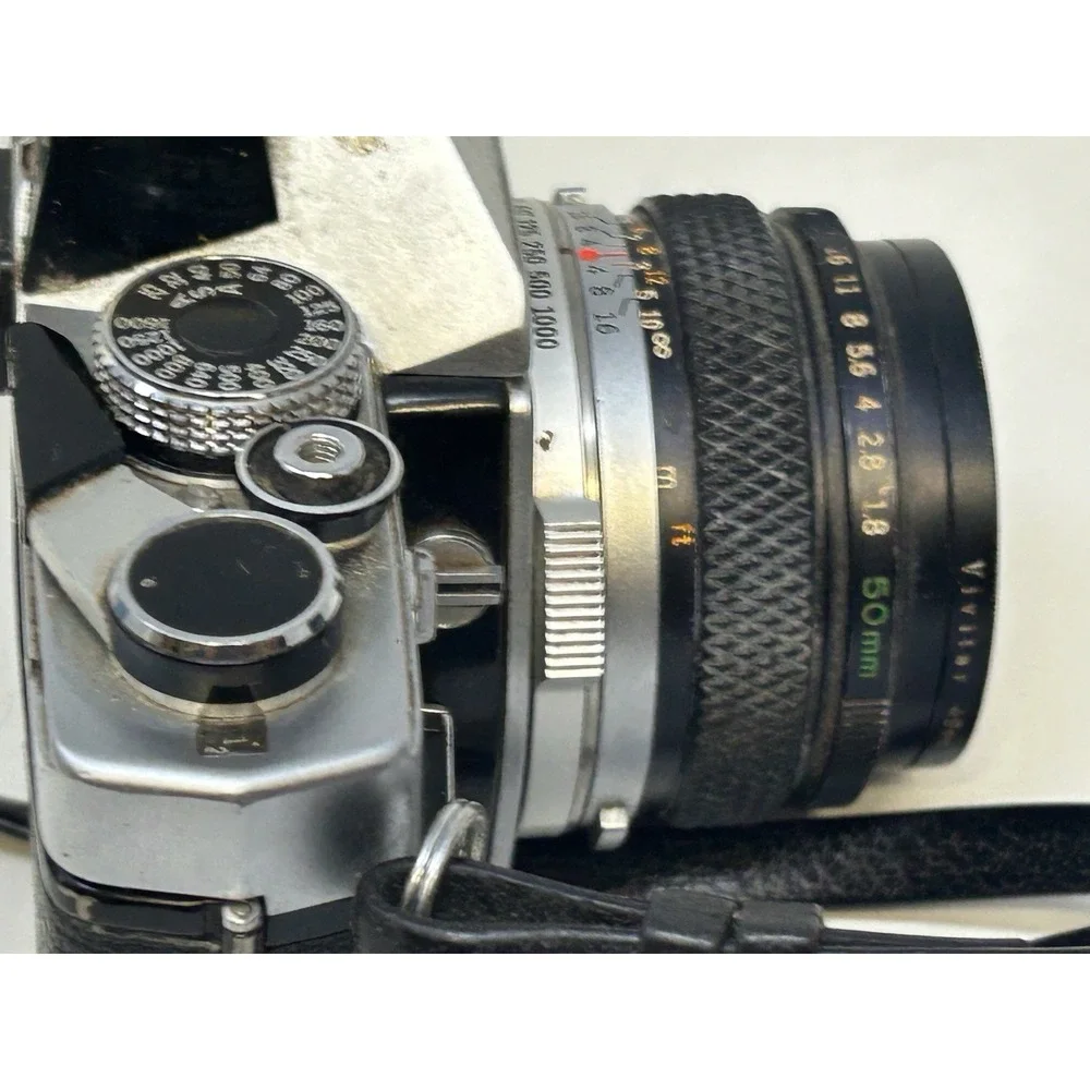 Olympus OM-1 35mm Film Camera w/ F.Zuiko 50mm f/1.8 + Fotomat 28–80mm Lens